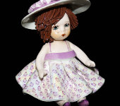 Статуэтка "Кукла сидящая с темными волосами в розовом платье", Zampiva