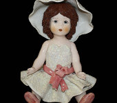 Статуэтка "Кукла сидящая с темными волосами в белом платье", Zampiva