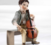 Фарфоровая кукла "Мальчик играющий на контробасе", Sibania