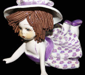Статуэтка "Кукла лежащая с темными волосами в розовом платье ", Zampiva