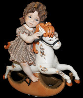 Фарфоровая кукла "Девочка, сидящая на лошадке-качалке", Sibania
